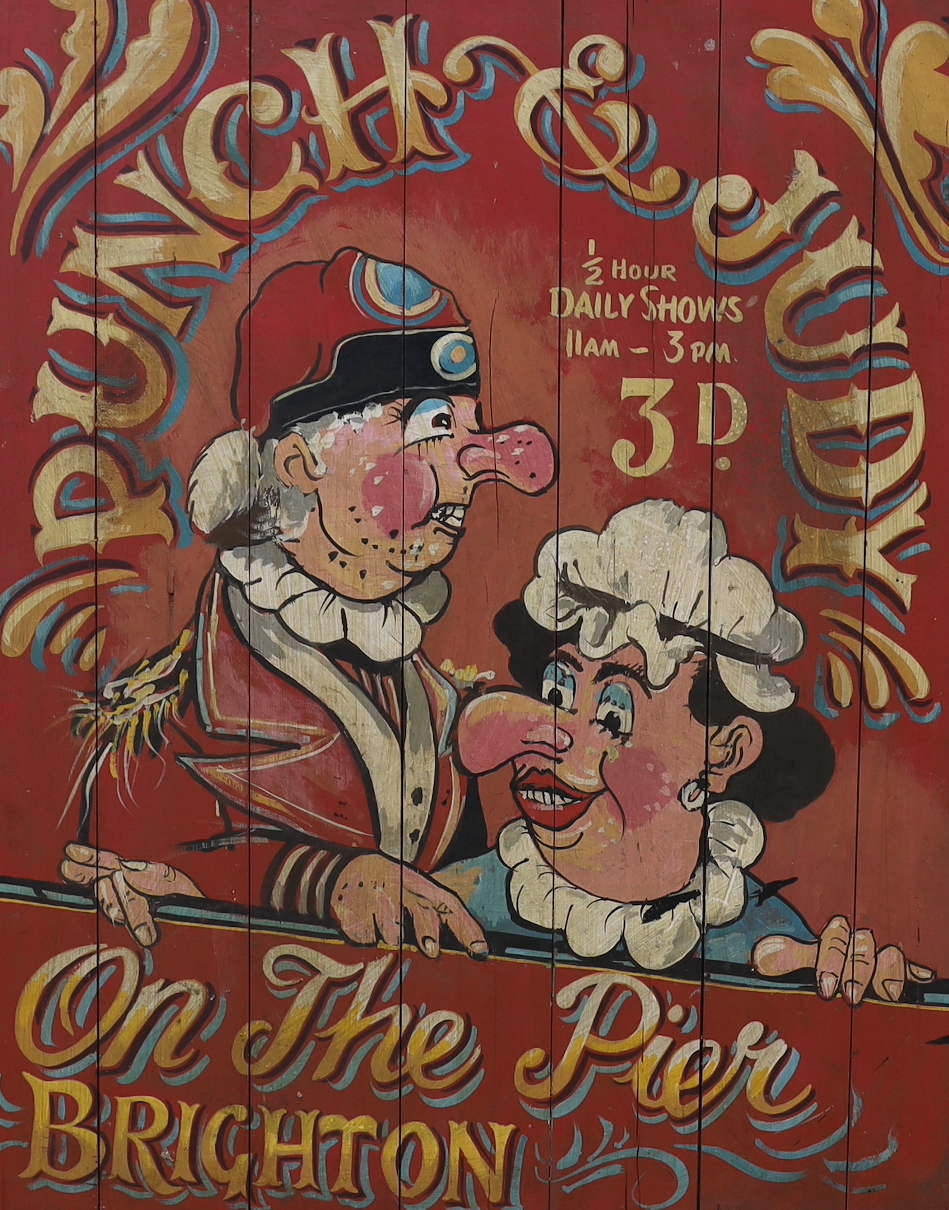 A painted wooden advertising Brighton Punch & Judy sign, 90cm high x 75cm wide